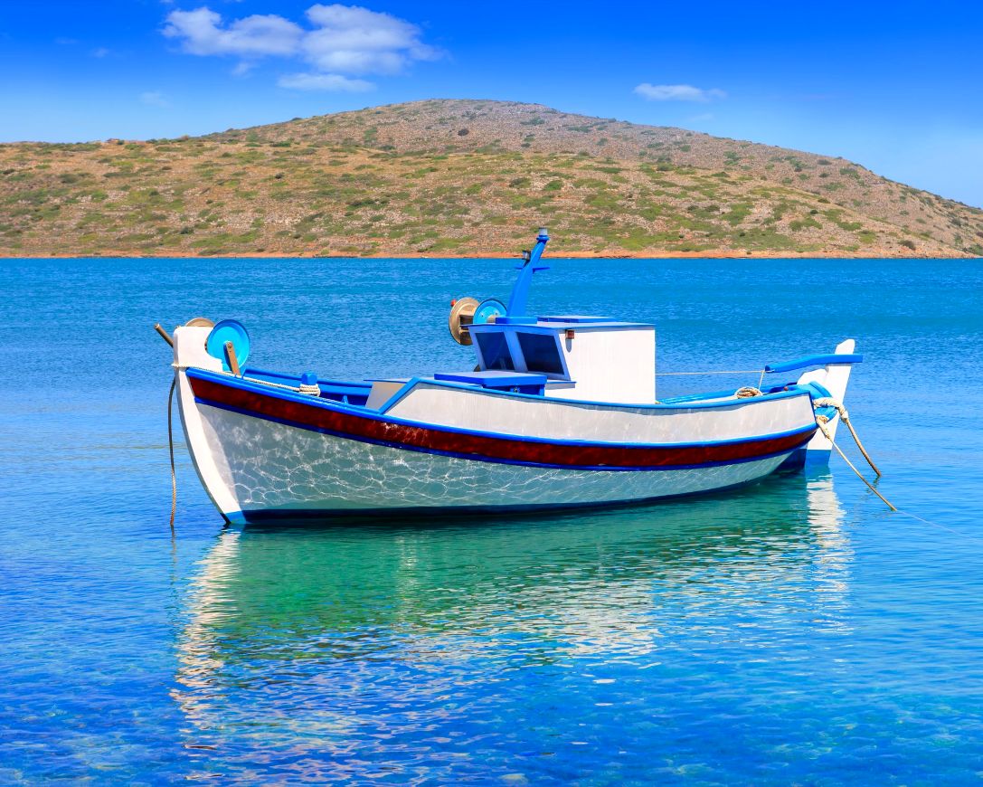 bigstock-Fishing-Boat-Off-The-Coast-Of--88047995_result
